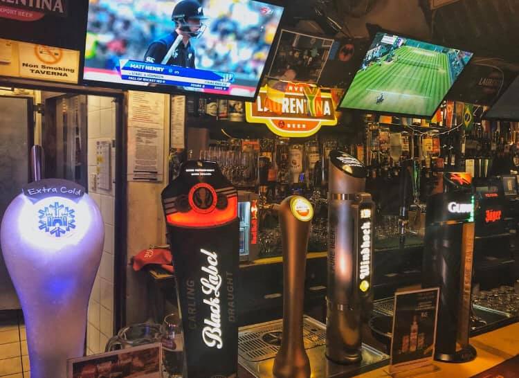 Vasco Da Gama Taverna bar with beer taps and live sport on screens