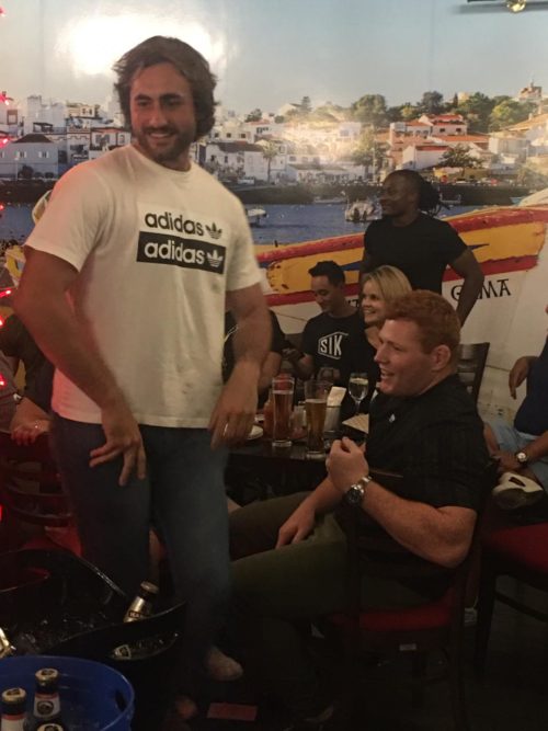 Stormers rugby team celebrating with fans inside Vasco's taverna