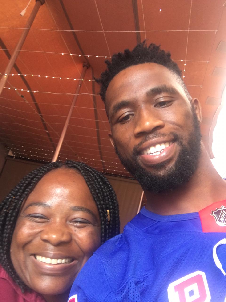 Siya Kolisi with fans and staff inside Vasco Da Gama Taverna